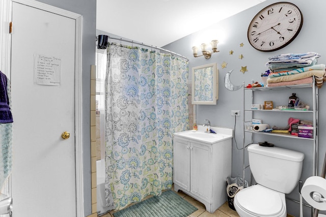 full bathroom featuring toilet, shower / bath combination with curtain, tile patterned flooring, and vanity