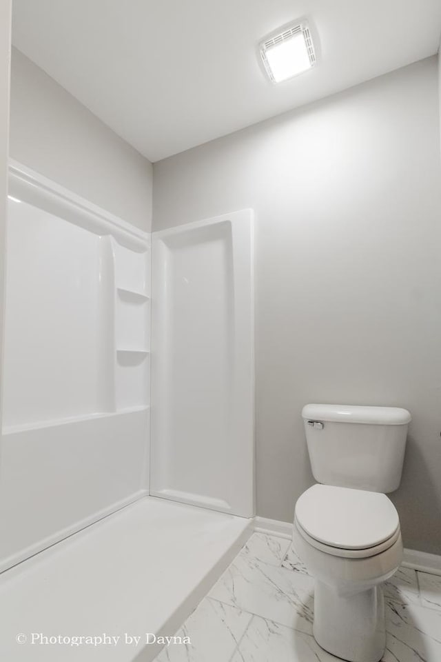 bathroom with visible vents, walk in shower, baseboards, marble finish floor, and toilet