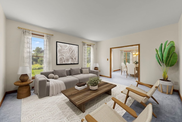 18040 Perth Ave, Homewood, IL 60430 - living area with healthy amount of natural light, light carpet, and a chandelier