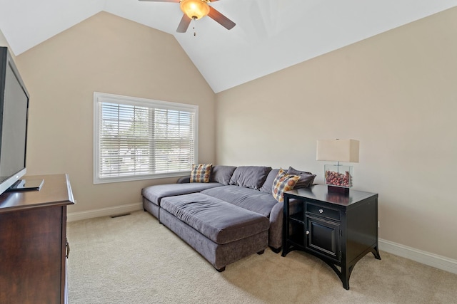 living room with visible vents, light carpet, baseboards, ceiling fan, and vaulted ceiling