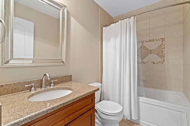 full bathroom with vanity, shower / bath combo, and toilet