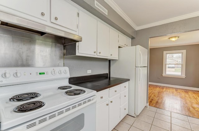 26W441 Geneva Rd, Wheaton, IL 60187 - kitchen with light tile patterned floors, white cabinets, under cabinet range hood, ornamental molding, and white appliances