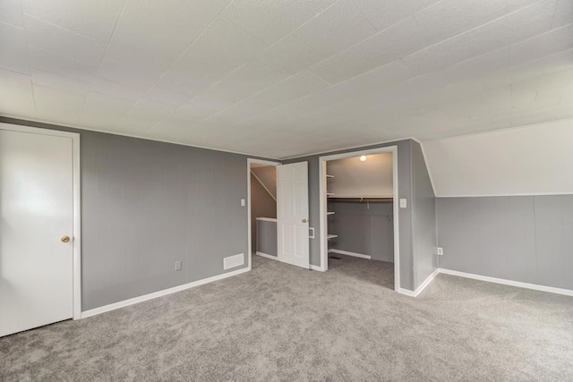26W441 Geneva Rd, Wheaton, IL 60187 - hallway featuring light tile patterned flooring, baseboards, and light carpet