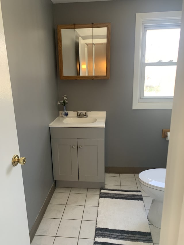 26W441 Geneva Rd, Wheaton, IL 60187 - unfurnished bedroom with a closet, visible vents, vaulted ceiling, carpet, and baseboards