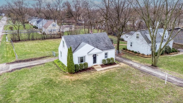 26W441 Geneva Rd, Wheaton, IL 60187 - view of front of home with aphalt driveway, a residential view, a chimney, roof with shingles, and fence