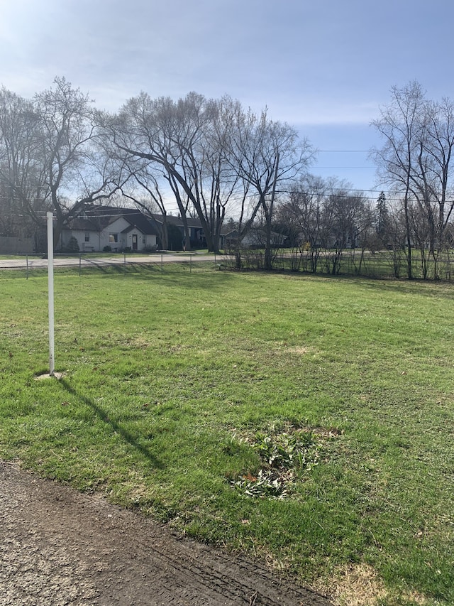 26W441 Geneva Rd, Wheaton, IL 60187 - view of home's exterior featuring a lawn and an outbuilding