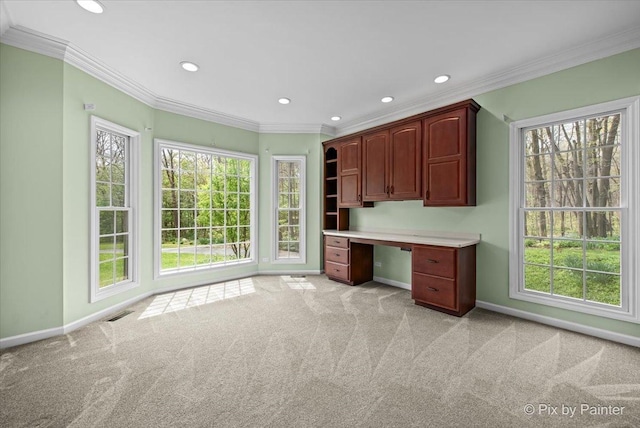 unfurnished office with recessed lighting, baseboards, light carpet, and ornamental molding