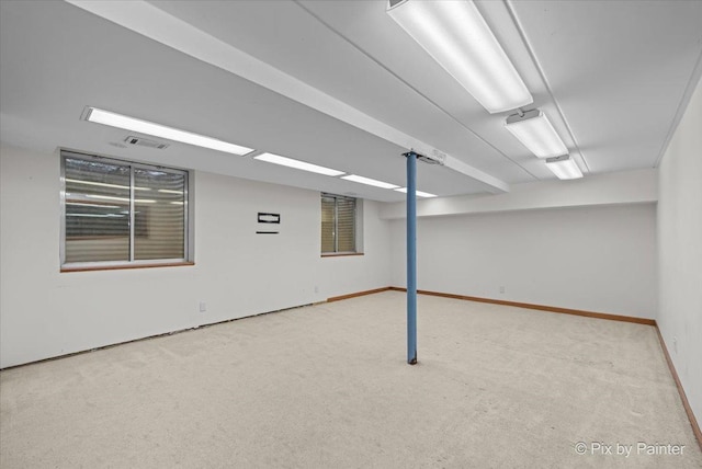finished below grade area with carpet floors and baseboards