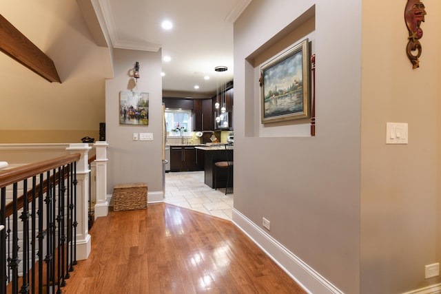 111 Grace Ln, Fox River Grove, IL 60021 - hall with light wood-type flooring, ornamental molding, baseboards, and recessed lighting