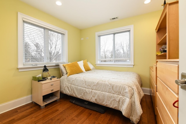 111 Grace Ln, Fox River Grove, IL 60021 - bedroom with multiple windows, dark wood-type flooring, and visible vents