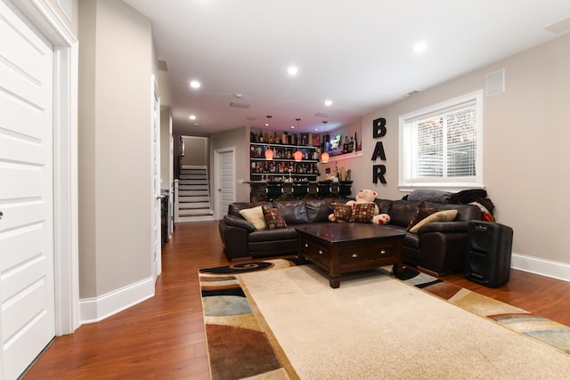 111 Grace Ln, Fox River Grove, IL 60021 - living room featuring recessed lighting, baseboards, a dry bar, and wood finished floors