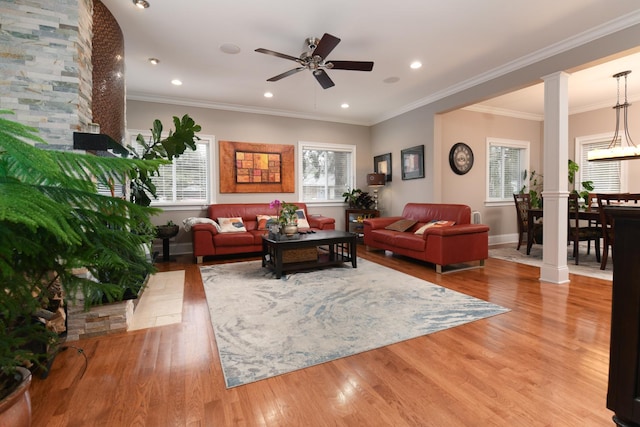 111 Grace Ln, Fox River Grove, IL 60021 - living area featuring baseboards, ceiling fan, ornate columns, and wood finished floors