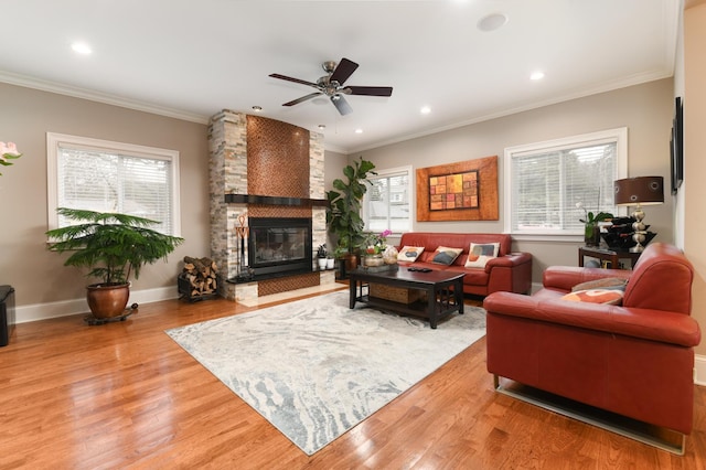 111 Grace Ln, Fox River Grove, IL 60021 - living room featuring a healthy amount of sunlight, ceiling fan, ornamental molding, and wood finished floors