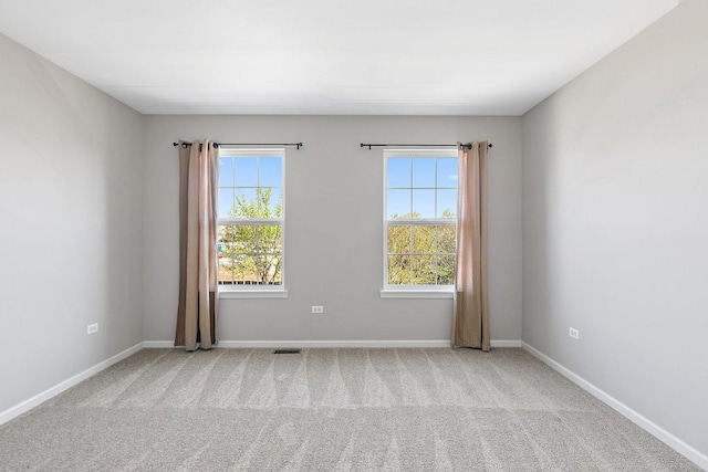 591 Waterford Rd, Elgin, IL 60124 - carpeted empty room featuring baseboards