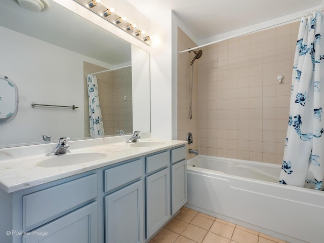 bathroom featuring a sink, tile patterned floors, double vanity, and shower / tub combo with curtain