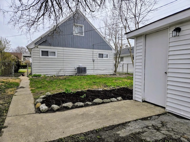16117 Wolcott Ave, Markham, IL 60428 - view of side of home with central air condition unit and fence