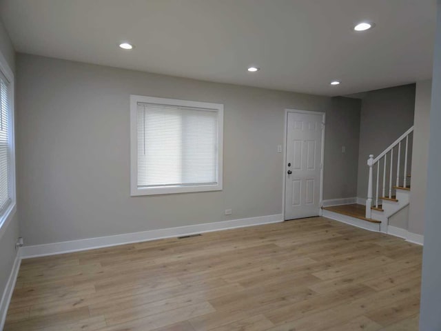 16117 Wolcott Ave, Markham, IL 60428 - foyer featuring visible vents, baseboards, stairway, light wood finished floors, and recessed lighting