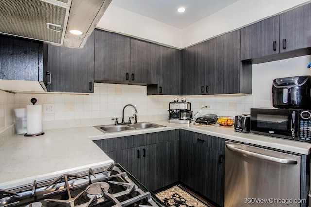 kitchen featuring range hood, dishwasher, a sink, light countertops, and black microwave