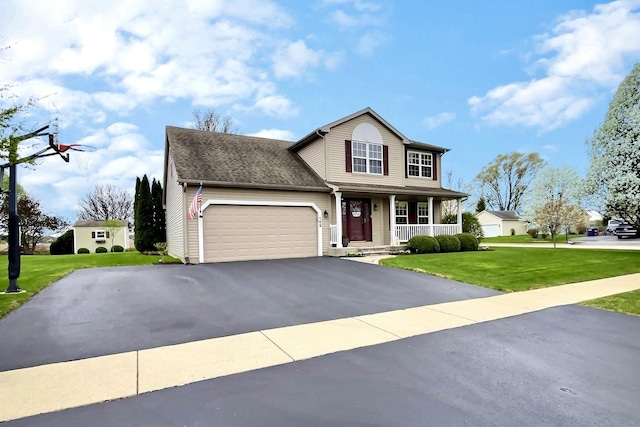 102 W Auburndale Ave, Cortland, IL 60112 - view of front of house with a garage, covered porch, driveway, and a front yard