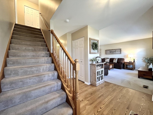 102 W Auburndale Ave, Cortland, IL 60112 - staircase featuring baseboards and wood finished floors