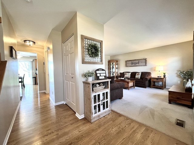 102 W Auburndale Ave, Cortland, IL 60112 - hall with baseboards and wood finished floors