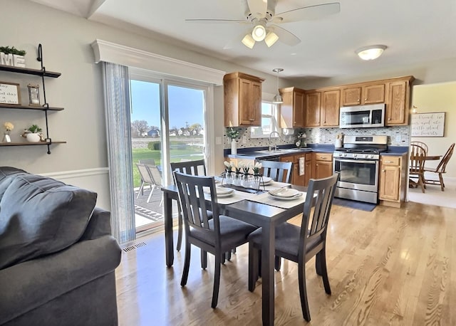 102 W Auburndale Ave, Cortland, IL 60112 - dining area with ceiling fan, visible vents, and light wood-style floors