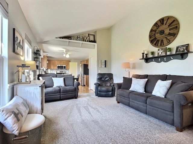 102 W Auburndale Ave, Cortland, IL 60112 - living room with a ceiling fan, high vaulted ceiling, and light colored carpet