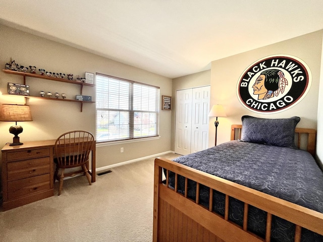 102 W Auburndale Ave, Cortland, IL 60112 - carpeted bedroom with baseboards, visible vents, and a closet