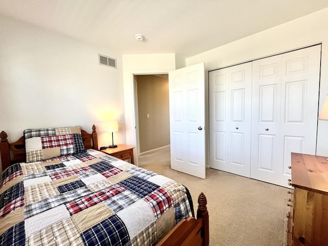 102 W Auburndale Ave, Cortland, IL 60112 - bedroom featuring visible vents, light carpet, and a closet