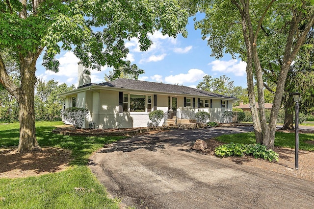 15150 109th Ave, Orland Park, IL 60467 - single story home featuring covered porch, a chimney, asphalt driveway, and brick siding