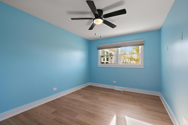 15150 109th Ave, Orland Park, IL 60467 - unfurnished room featuring wood finished floors, baseboards, and ceiling fan