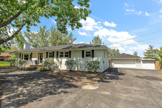 15150 109th Ave, Orland Park, IL 60467 - ranch-style home featuring covered porch, a detached garage, an outdoor structure, and a chimney