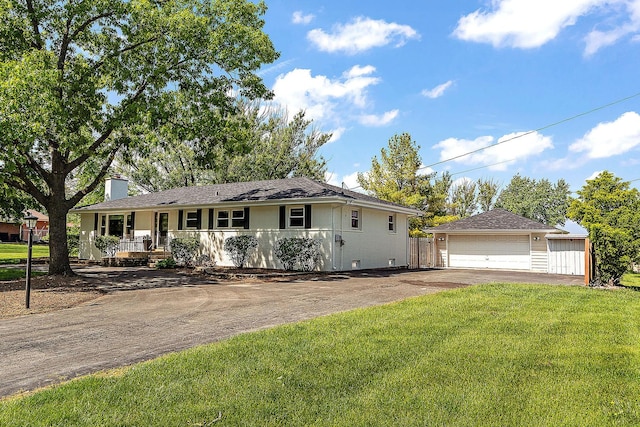 15150 109th Ave, Orland Park, IL 60467 - ranch-style home with a detached garage, an outdoor structure, a front lawn, covered porch, and a chimney