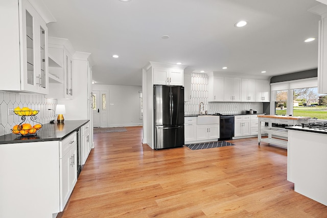 15150 109th Ave, Orland Park, IL 60467 - kitchen with black appliances, dark countertops, tasteful backsplash, white cabinets, and recessed lighting