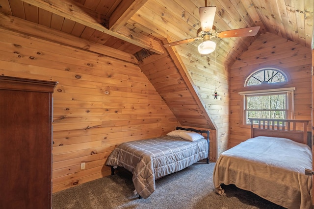 carpeted bedroom with wood ceiling, wood walls, a ceiling fan, and vaulted ceiling