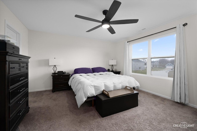 927 Hyte St, Plano, IL 60545 - carpeted bedroom with baseboards and a ceiling fan