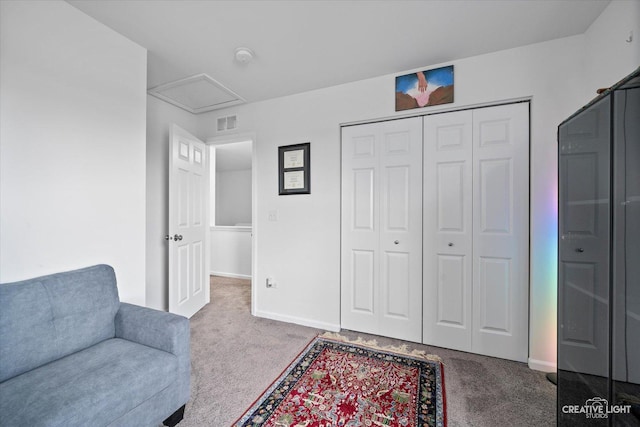 927 Hyte St, Plano, IL 60545 - living area with carpet, visible vents, baseboards, and attic access