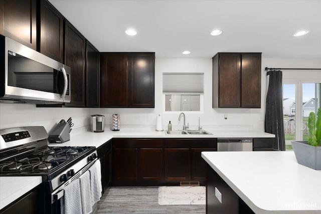 927 Hyte St, Plano, IL 60545 - kitchen with light countertops, appliances with stainless steel finishes, a sink, and visible vents