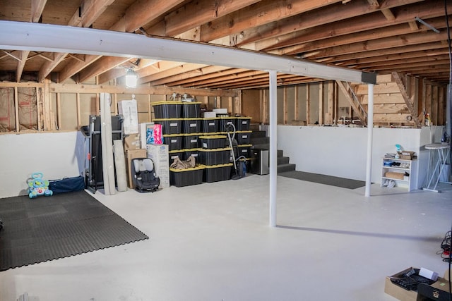 unfinished basement with stairway
