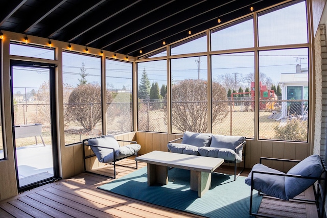 sunroom with an outdoor hangout area