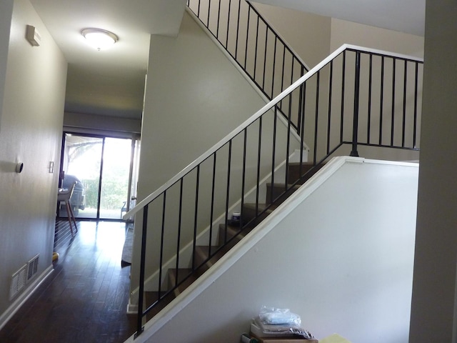 275 London Pl Unit 275, Wheeling, IL 60090 - stairway with baseboards, visible vents, and hardwood / wood-style flooring