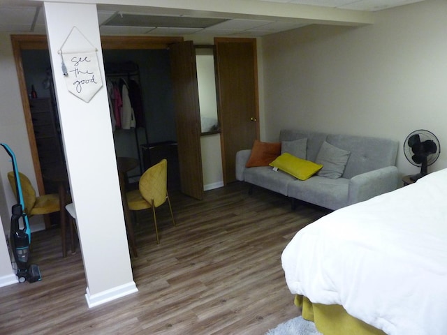 275 London Pl Unit 275, Wheeling, IL 60090 - bedroom with a closet, baseboards, wood finished floors, and a drop ceiling