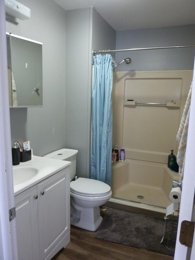 275 London Pl Unit 275, Wheeling, IL 60090 - full bathroom with vanity, wood finished floors, toilet, and a shower stall