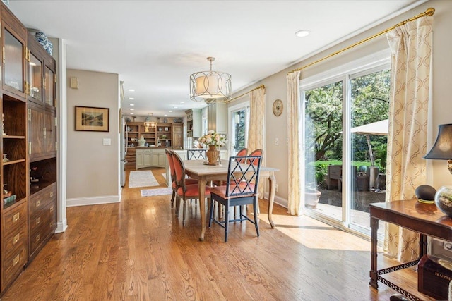 401 Aurora Ct, Vernon Hills, IL 60061 - dining room featuring recessed lighting, a notable chandelier, baseboards, and wood finished floors