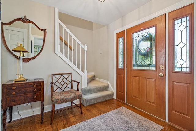 401 Aurora Ct, Vernon Hills, IL 60061 - entryway featuring wood finished floors, stairs, baseboards, and a wealth of natural light