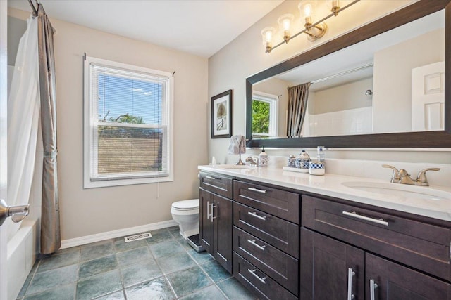 401 Aurora Ct, Vernon Hills, IL 60061 - full bath featuring visible vents, toilet, a sink, double vanity, and baseboards
