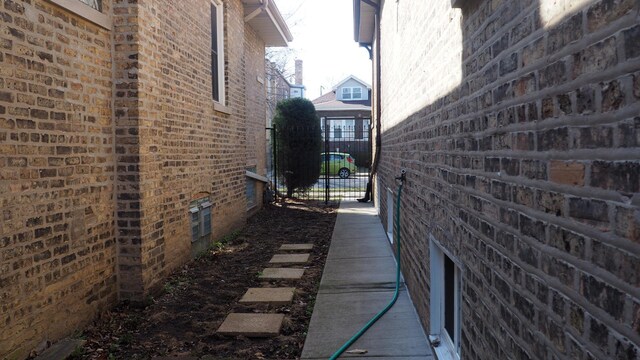 3005 N Kostner Ave, Chicago, IL 60641 - view of side of property with brick siding