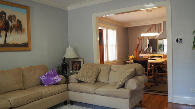 3005 N Kostner Ave, Chicago, IL 60641 - living area with wood finished floors, baseboards, ornamental molding, and stairway