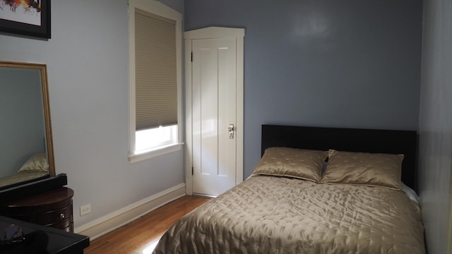 3005 N Kostner Ave, Chicago, IL 60641 - bedroom with wood finished floors and baseboards