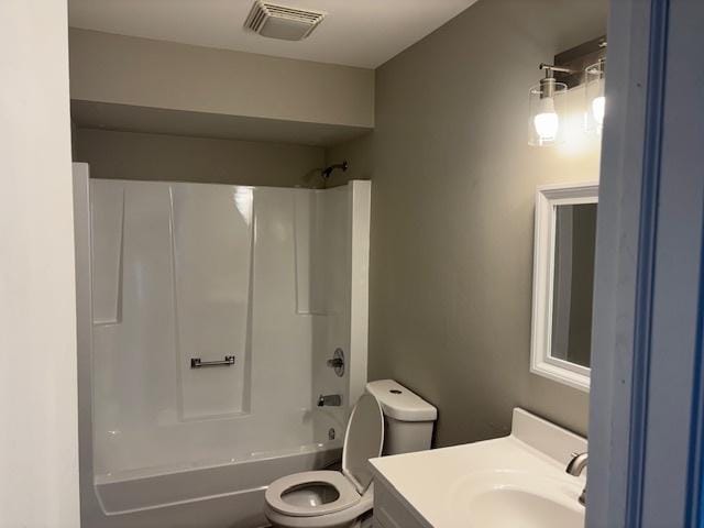 638 Virgil Ave, Elgin, IL 60120 - full bath featuring visible vents, shower / bathtub combination, toilet, and vanity